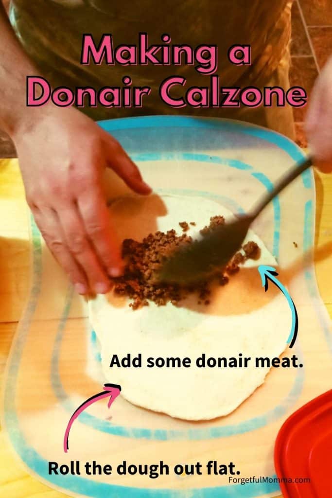 Making a Donair Calzone - Calzone bing prepared with text overlay